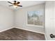Neat bedroom with hard wood floors, blinds, and a ceiling fan at 1985 Hastings Dr, Clearwater, FL 33763