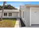 Charming single-story home with a well-maintained lawn and attached two-car garage at 1985 Hastings Dr, Clearwater, FL 33763