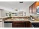 Charming kitchen featuring stainless steel appliances and a view into the living area at 1985 Hastings Dr, Clearwater, FL 33763