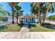 Charming single-story home featuring palm trees and a well-maintained front yard at 212 28Th S St, St Petersburg, FL 33712