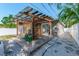 Enjoy outdoor living on this covered patio with an outdoor kitchen, perfect for entertaining and relaxation at 212 28Th S St, St Petersburg, FL 33712