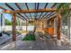 Spacious covered patio featuring a hot tub and convenient outdoor kitchen, perfect for relaxation and entertainment at 212 28Th S St, St Petersburg, FL 33712