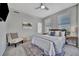 Comfortable bedroom featuring neutral walls, plush carpet, and natural light from the windows at 226 5Th N Ave # 605, St Petersburg, FL 33701