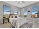 Inviting bedroom featuring city views, neutral walls, plush carpet, and plenty of natural light at 226 5Th N Ave # 605, St Petersburg, FL 33701