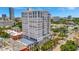 Modern white condo building featuring contemporary architecture, large windows, and surrounding greenery at 226 5Th N Ave # 605, St Petersburg, FL 33701