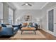 Cozy living room with a sofa, coffee table, and bright windows, offering serene city views at 226 5Th N Ave # 605, St Petersburg, FL 33701
