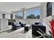 Relaxing indoor lounge area with modern seating, natural light, and views of surrounding greenery at 226 5Th N Ave # 605, St Petersburg, FL 33701