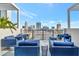 Outdoor patio featuring comfortable seating with a beautiful city skyline in the background at 226 5Th N Ave # 605, St Petersburg, FL 33701