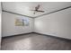 Simple bedroom with neutral walls and modern tile flooring at 2275 62Nd N Ave # 5202, St Petersburg, FL 33702