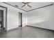 Bedroom with tile flooring and doors to the ensuite bath and closet at 2275 62Nd N Ave # 5202, St Petersburg, FL 33702