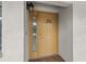 Inviting front door with a sidelight window and stylish exterior lighting at 2275 62Nd N Ave # 5202, St Petersburg, FL 33702