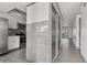 Updated kitchen featuring stainless steel appliances, tile backsplash and flooring at 2275 62Nd N Ave # 5202, St Petersburg, FL 33702