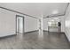 Open-concept living room boasts ceramic floors and an opening to the kitchen at 2275 62Nd N Ave # 5202, St Petersburg, FL 33702