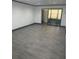 Open-concept living area featuring durable flooring and natural light at 2275 62Nd N Ave # 5202, St Petersburg, FL 33702
