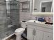 Bathroom featuring a glass-enclosed shower and a contemporary vanity with a sink at 2830 W Bay Haven Dr, Tampa, FL 33611