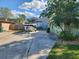Long driveway with parking space for a boat in front of garage at 2830 W Bay Haven Dr, Tampa, FL 33611