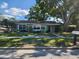 Charming single-story home featuring a well-manicured lawn and mature trees adding great curb appeal at 2830 W Bay Haven Dr, Tampa, FL 33611