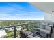 Relaxing balcony with comfortable seating and panoramic city views at 2910 W Barcelona St # 1902, Tampa, FL 33629