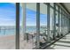 Luxury outdoor seating area overlooking a resort-style pool and ocean view at 2910 W Barcelona St # 1902, Tampa, FL 33629