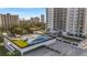 Aerial view of a rooftop basketball court with a seating area and building skyline at 2910 W Barcelona St # 1902, Tampa, FL 33629