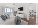 Bright bedroom with floor-to-ceiling windows, water view, and open doorway to living space at 2910 W Barcelona St # 1902, Tampa, FL 33629