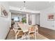 Dining area with a large table, comfortable seating, and modern lighting at 2910 W Barcelona St # 1902, Tampa, FL 33629