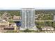 Aerial view showcasing a modern high-rise with balconies overlooking a vibrant cityscape at 2910 W Barcelona St # 1902, Tampa, FL 33629