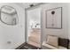 Inviting hallway with bench and decor, leading to the dining room and kitchen at 2910 W Barcelona St # 1902, Tampa, FL 33629