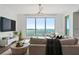 Bright living room with a large window offering beautiful water views at 2910 W Barcelona St # 1902, Tampa, FL 33629