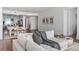 Bright, open-plan living area with modern furniture, stylish decor, and a ceiling fan at 2910 W Barcelona St # 1902, Tampa, FL 33629