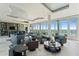 Luxury living room with a wet bar, oversized windows and comfortable seating at 2910 W Barcelona St # 1902, Tampa, FL 33629