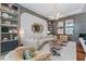 Chic lounge area with unique lighting, elegant decor, and comfortable seating arrangements at 2910 W Barcelona St # 1902, Tampa, FL 33629