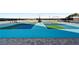 Outdoor pickleball court with blue and green playing surface and net at 2910 W Barcelona St # 1902, Tampa, FL 33629