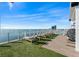 Pool deck featuring lounge chairs, ocean views, and a modern design at 2910 W Barcelona St # 1902, Tampa, FL 33629