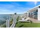 Stunning pool deck with lounge chairs, cabanas, and ocean views at 2910 W Barcelona St # 1902, Tampa, FL 33629