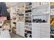 Organized walk-in closet with shelving and drawers for ample storage at 2910 W Barcelona St # 1902, Tampa, FL 33629