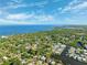 Beautiful aerial view of a coastal neighborhood on a sunny day near the sea at 294 Kentucky Ave, Crystal Beach, FL 34681