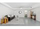 Finished basement area featuring modern decor, tile floors, and neutral colors at 294 Kentucky Ave, Crystal Beach, FL 34681