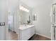 Bathroom features modern vanity, neutral colors, and bright lighting at 294 Kentucky Ave, Crystal Beach, FL 34681