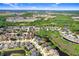 Scenic aerial view of waterfront homes with serene ponds surrounded by lush greenery and mature landscaping at 29737 Fog Hollow Dr, Wesley Chapel, FL 33543