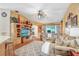 Cozy living room with comfortable seating and large windows at 29737 Fog Hollow Dr, Wesley Chapel, FL 33543