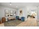 Stylish seating area showcases an eclectic mix of art, furniture, and decor at 30247 Fairway Dr, Wesley Chapel, FL 33543