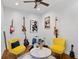 Cozy bonus room with musical instruments, stylish furniture, and eclectic decor for entertainment and relaxation at 3325 W Wallcraft Ave, Tampa, FL 33611