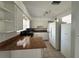 Bright kitchen featuring white cabinets and complementary countertops at 3599 66Th N Way, St Petersburg, FL 33710