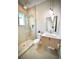 Contemporary bathroom with a frameless glass shower and floating vanity at 4321 S Renellie Dr, Tampa, FL 33611