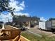 Image of a new construction site with the block structure of a modern home against a backdrop of blue sky and scattered clouds at 4321 S Renellie Dr, Tampa, FL 33611