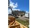 Image of a new construction site with the block structure of a modern home against a backdrop of blue sky and scattered clouds at 4321 S Renellie Dr, Tampa, FL 33611