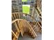 Image displays a spiral staircase under construction with wooden frames, soon leading to more rooms with natural lighting at 4321 S Renellie Dr, Tampa, FL 33611