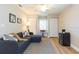 Comfortable living area with a sectional sofa, neutral walls, and minimalist decor at 4516 S Trask St, Tampa, FL 33611