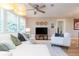 Cozy living room with plantation shutters, modern lighting, and comfortable seating arrangement at 4516 S Trask St, Tampa, FL 33611